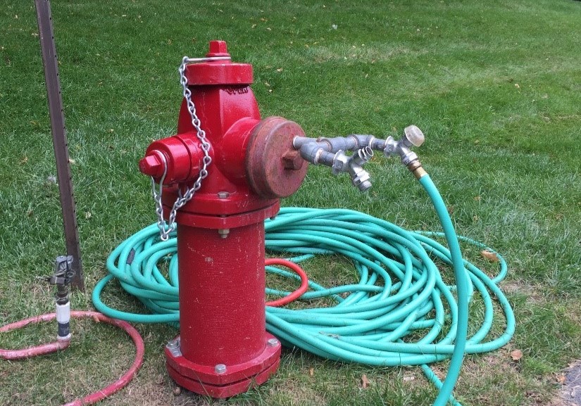 Hydrant-with-Hose-Connection - Ten Hazardous Cross-Connections Detected By Onsite Cross-Connection Surveys | HydroCorp - HydroCorp