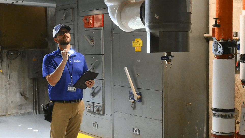 An onsite cross-connection control surveyor looks for hazardous cross-connections