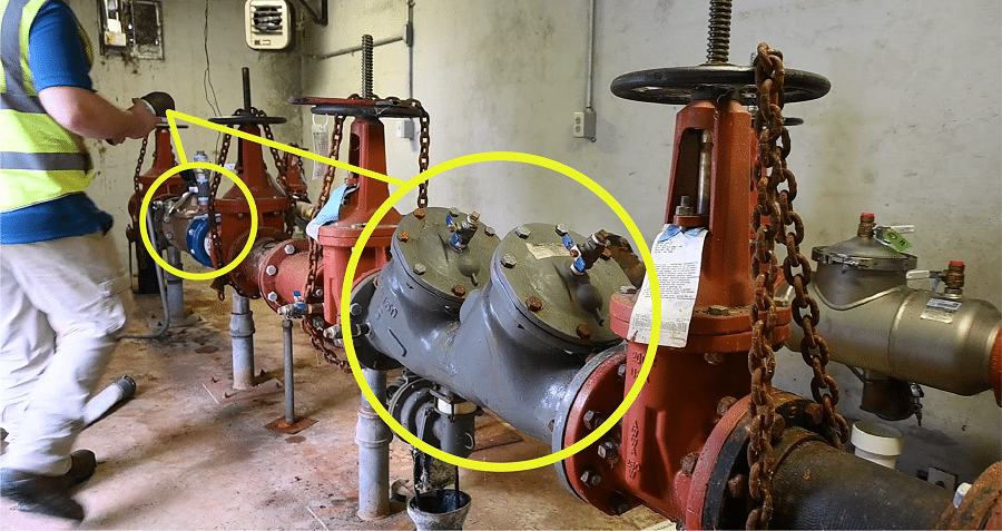 Watermarked-CCC-Inspector-at-1013-rpz-containment-900-PX-yellow-circle-1 - Double Your Water Service Line Inventory Efficiency | HydroCorp - HydroCorp