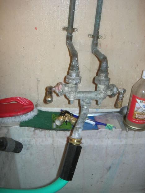 utility-sink-fixture-2-unprotected - 5 Connections Water Utility Staff Should Check in Their Own Homes | HydroCorp - HydroCorp